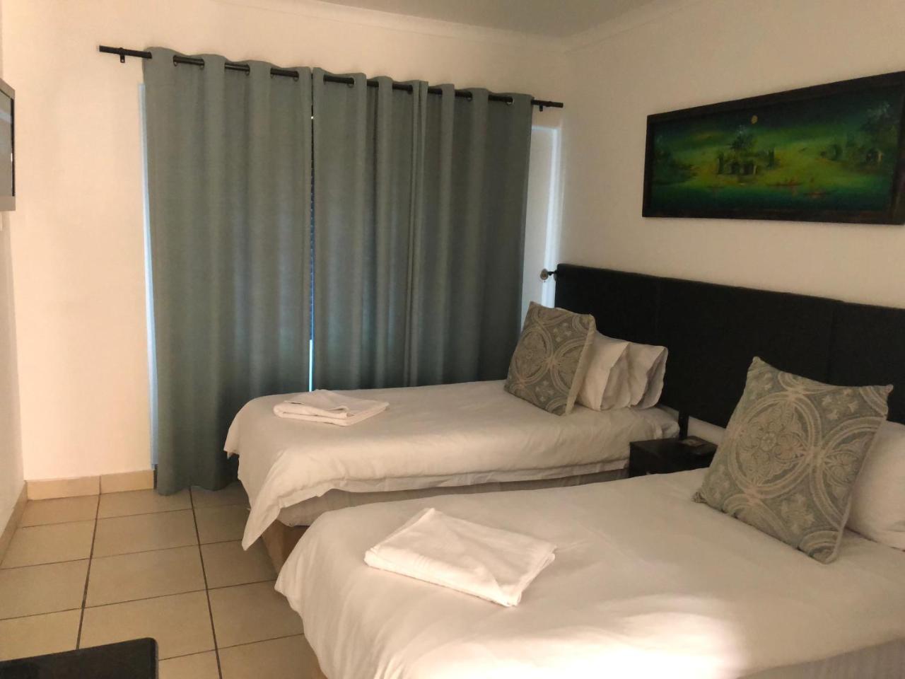 Me Casa Guest House Bluewater Bay Rum bild
